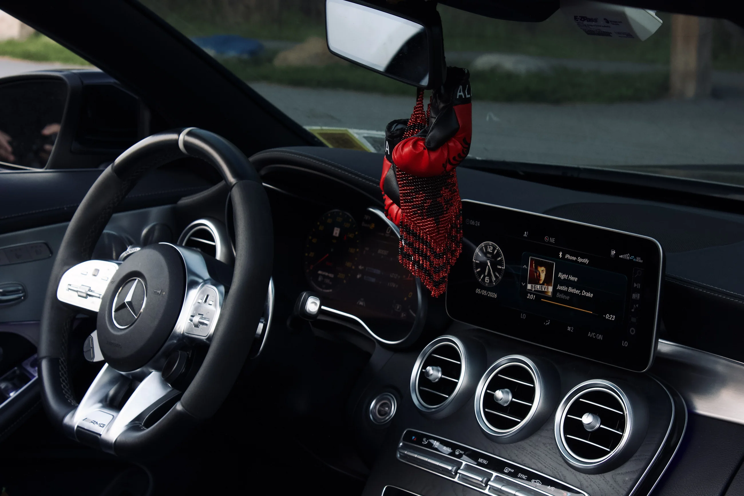 Mercedes dashboard and steering wheel seen from the passenger side