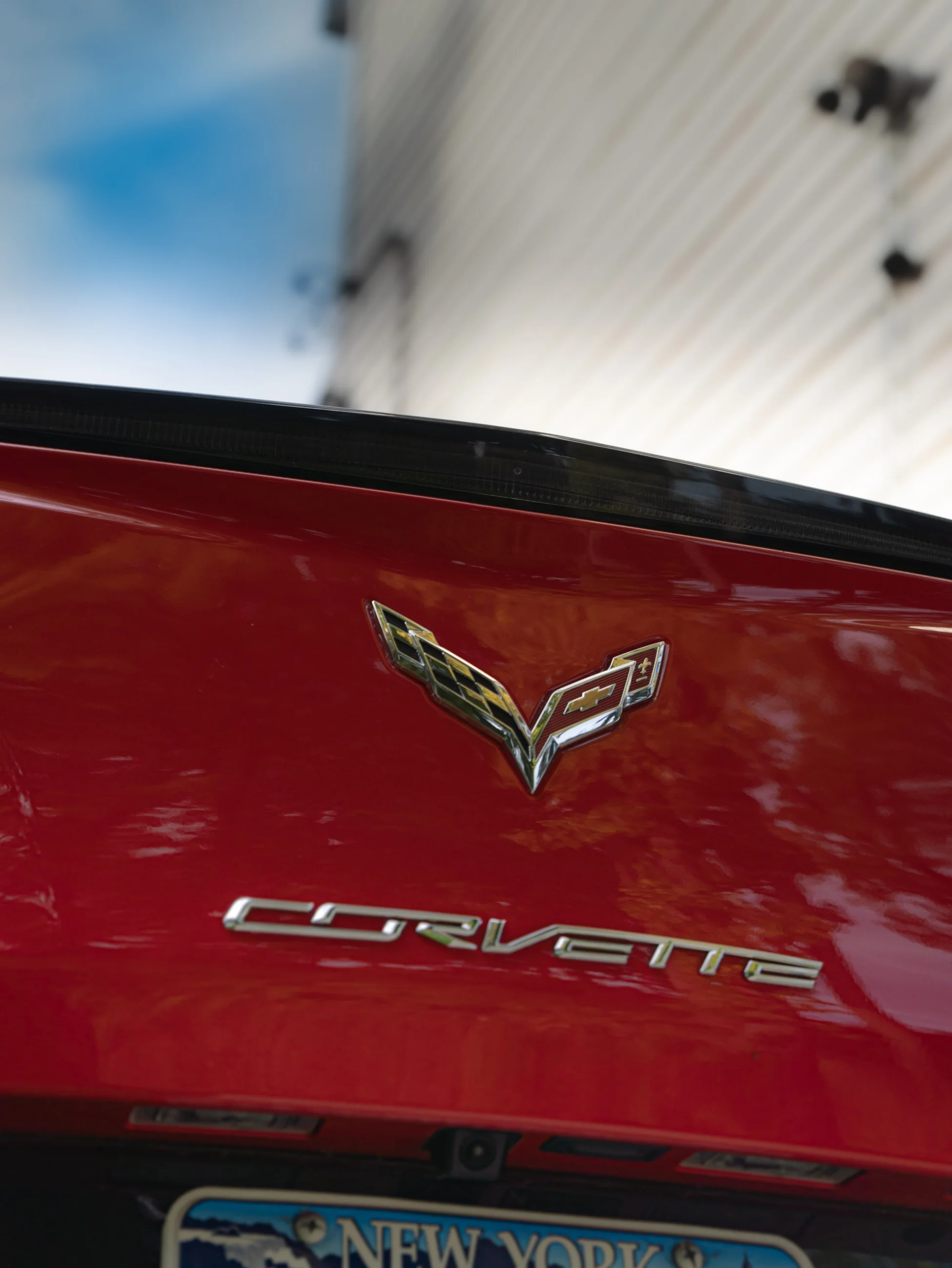 Red Corvette photographed from the rear